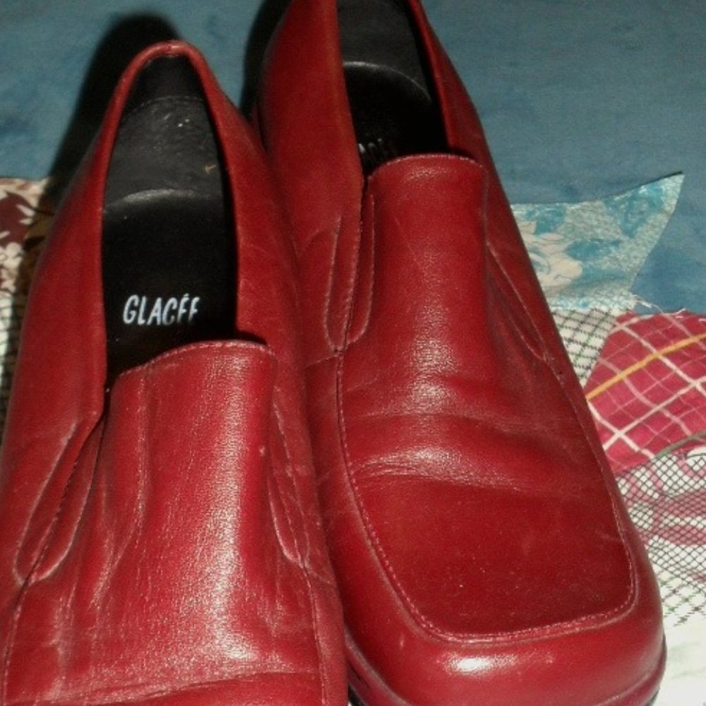 Square toed red leather loafers